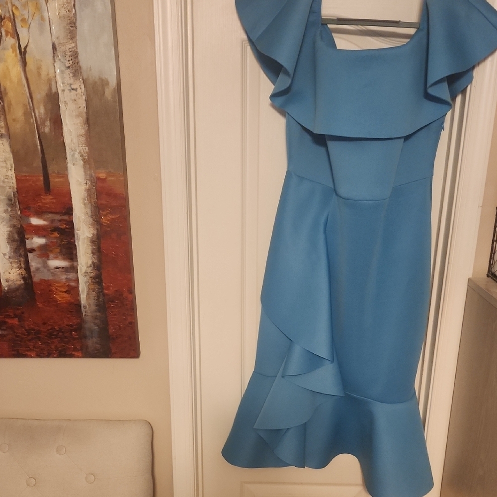 Elegant Blue Ruffle Dress. It is light blue size XL by Especially Yours for $30.